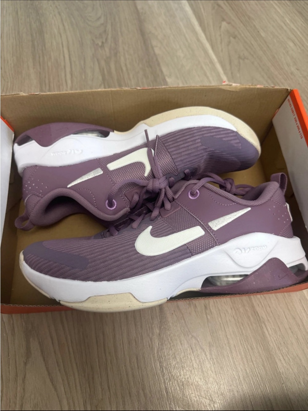 Nike Women's Purple Athletic Sneakers with White Swoosh
